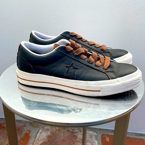 Converse customs low top black leather sneakers